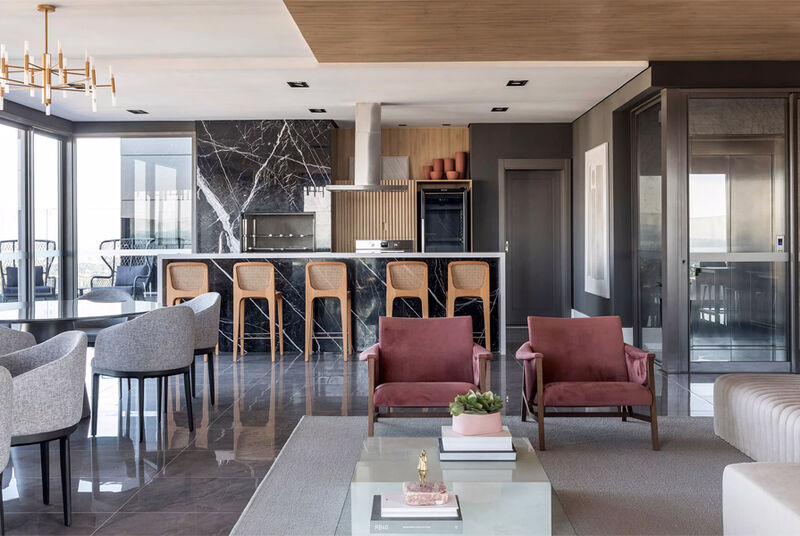 Sala de estar moderna com cozinha integrada e decoração elegante