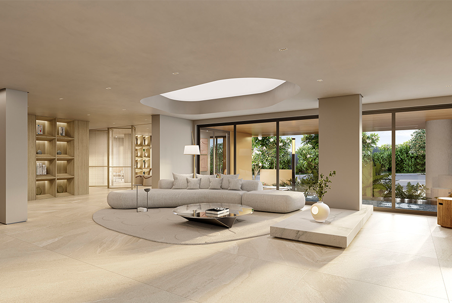 Sala de estar ampla e elegante, composta por um grande sofá curvo em tom claro, uma mesa de centro de design moderno, e uma claraboia oval no teto, com grandes portas de vidro que se abrem para uma área externa.
