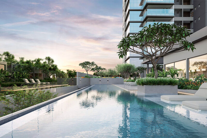 Piscina moderna em um condomínio elegante ao entardecer