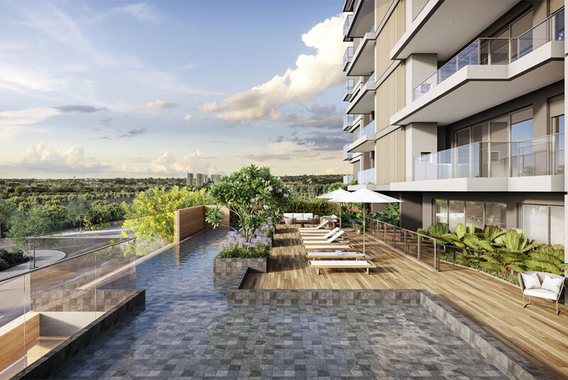 Área de lazer com piscina e espreguiçadeiras