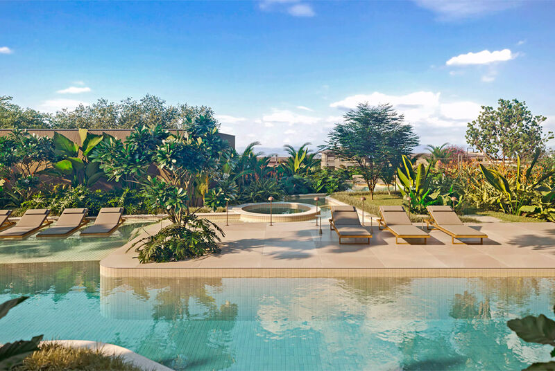 Área de lazer com piscina e espreguiçadeiras