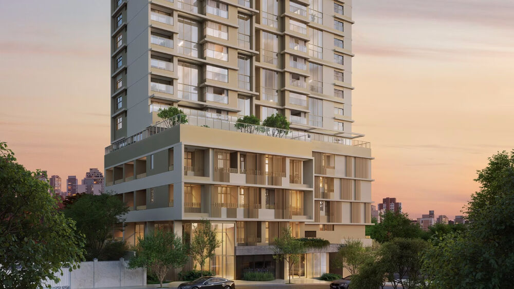 Edifício moderno com fachadas de vidro ao entardecer