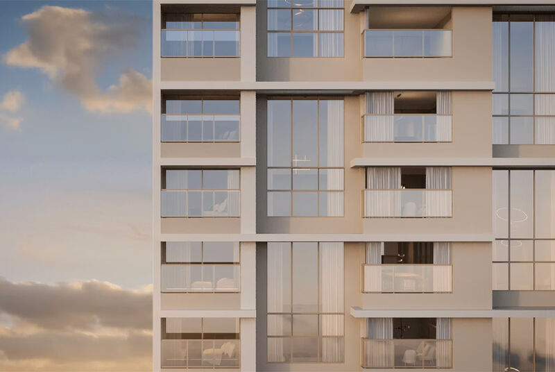 Fachada moderna de prédio residencial ao entardecer