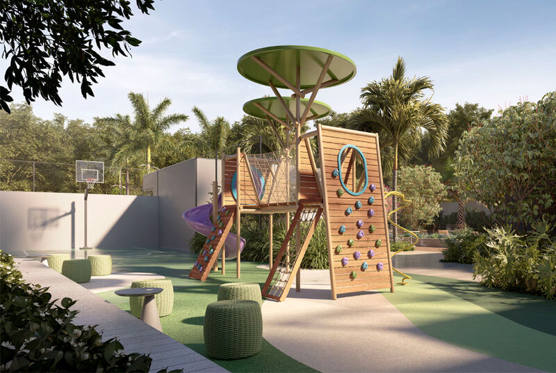 Parquinho com escorregador e parede de escalada ao ar livre.