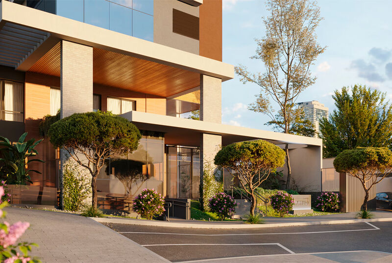 Fachada moderna de prédio residencial com paisagismo.