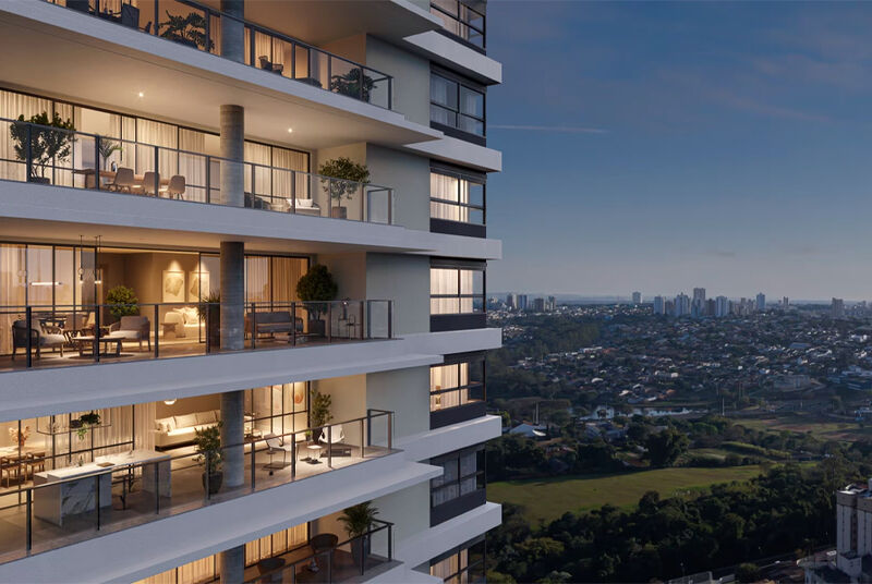 Vista noturna de apartamento em prédio moderno