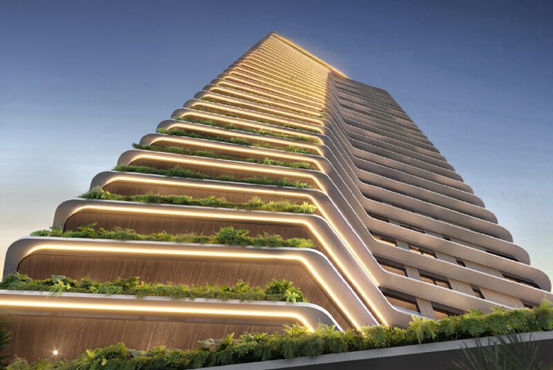 Fachada moderna de edifício com varandas verdes