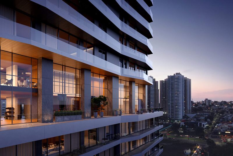 Fachada de edifício moderno com iluminação noturna