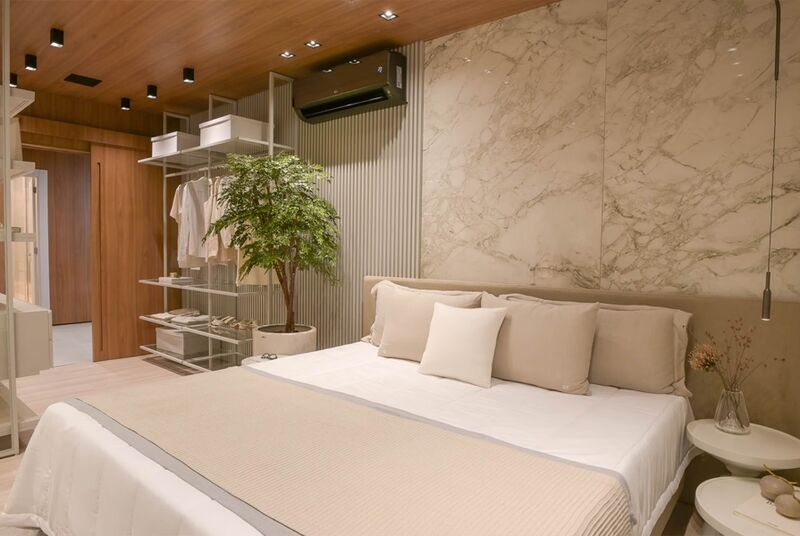 Quarto moderno com cama e decoração minimalista